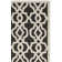 Tapis noir / crème touffeté à la main Daphne