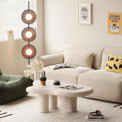 Clouddream Cream Table - A Sleek, Nordic-Inspired Piece With A Unique Irregular Design. Perfect For Small Spaces, It Adds Modern Elegance And Functionality To Any Room.