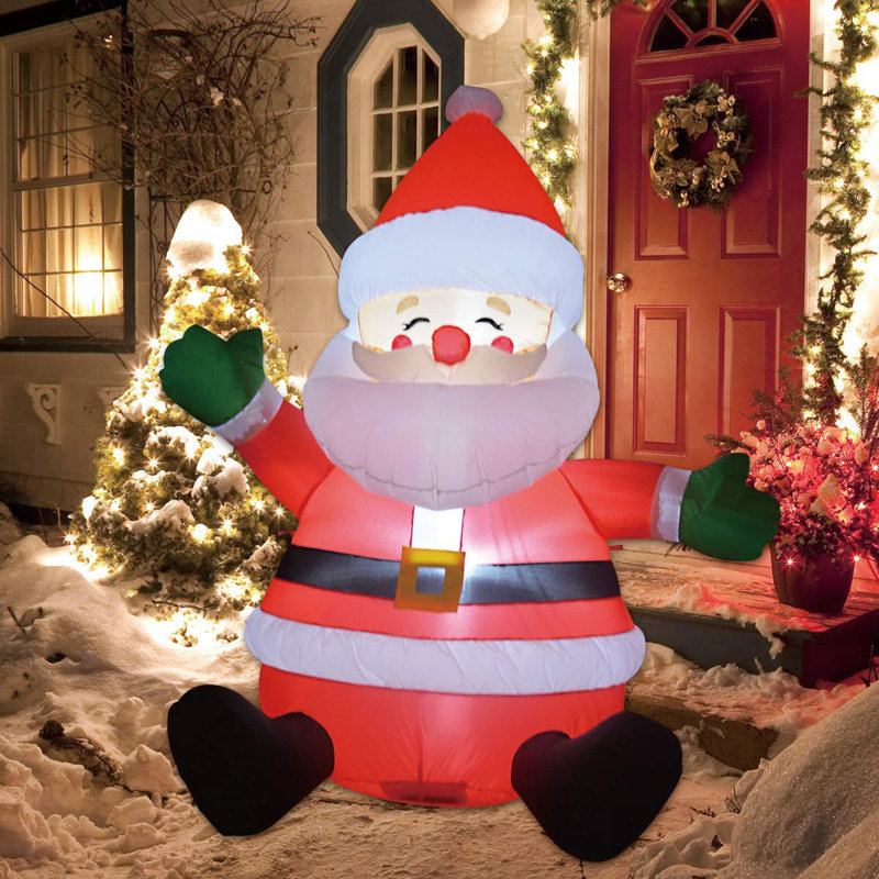 Père Noël gonflable de Noël assis à l'extérieur avec lumières DEL intégrées