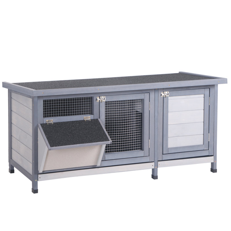 Chenil en bois gris avec toit imperméable