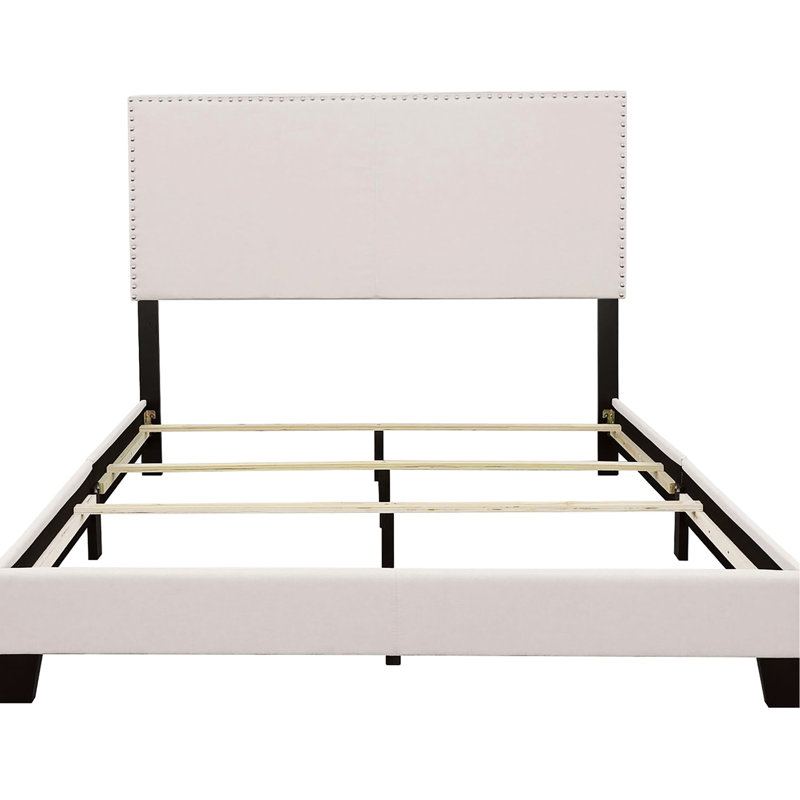 Lit simple dans la chambre à coucher avec tête de lit tapissier en tissu doux et pieds stables, Lit simple
