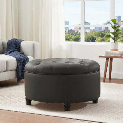 Table basse noire avec repose-pieds avec rangement et coussins boutonnés. Plateau de table amovible. Convient au salon, à la chambre à coucher ou au bureau.