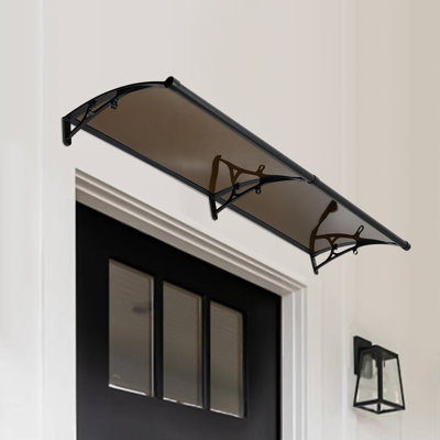 Auvent de porte / fenêtre rétractable en polycarbonate DENFER