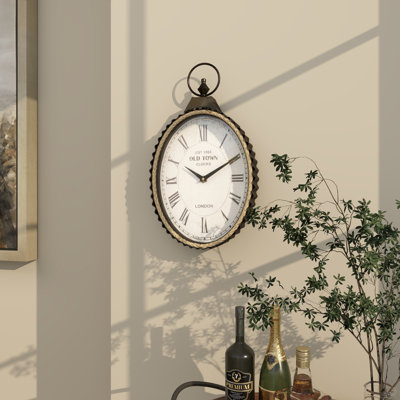 Mauney Metal Pocket Watch Style Decorative Black Wall Clock with Rope Accent