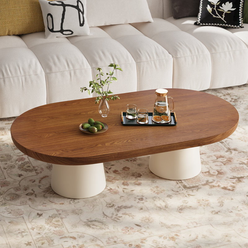 51.2" Oval Coffee Table with Wood-Grain Top and Cream Pedestal Base