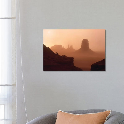 Sandstorm Enshrouding Mittens, Monument Valley, Arizona by Tim Fitzharris - Wrapped Canvas Print