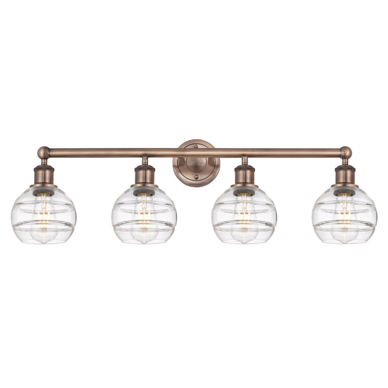 Éclairage pour meuble-lavabo à 4 lumières Chartoff, Transparent, Cuivre antique