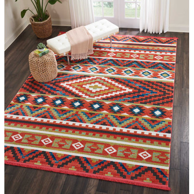 Tapis géométrique tissé à la machine en orange