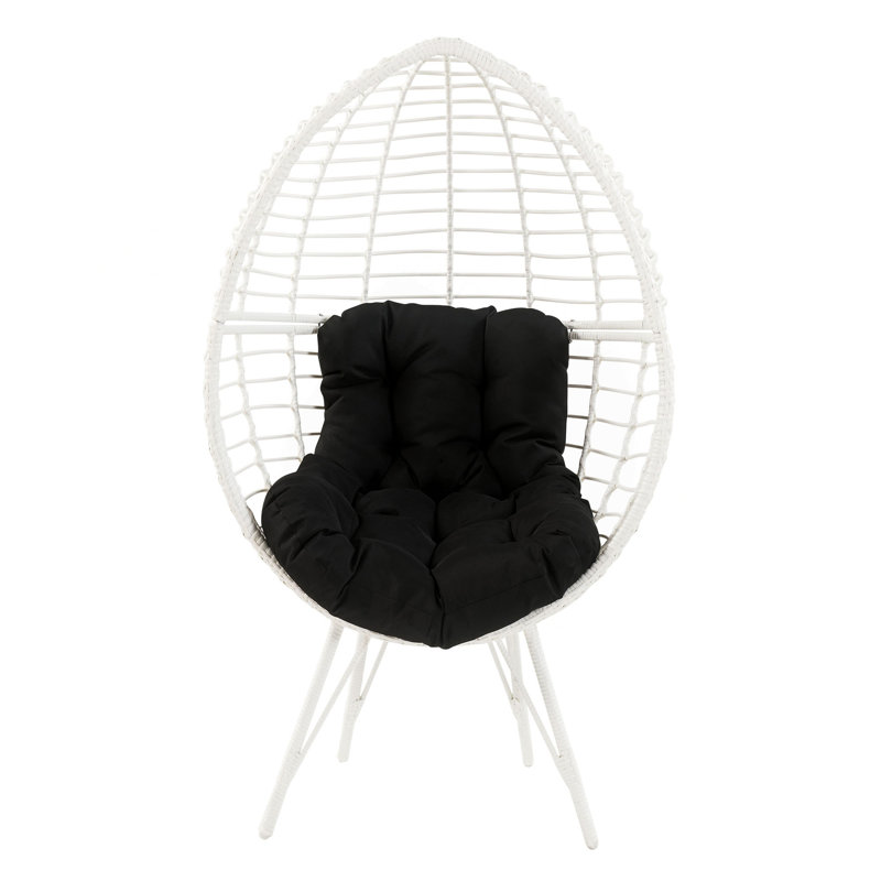 Chaise de patio noire et blanche avec coussin amovible