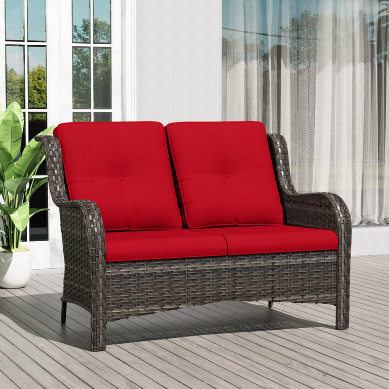 Anahit  Patio 49'' Wide Straight  Outdoor Wicker Loveseat with Cushions, Red