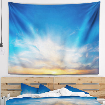 Paysage tapissier bleu ciel