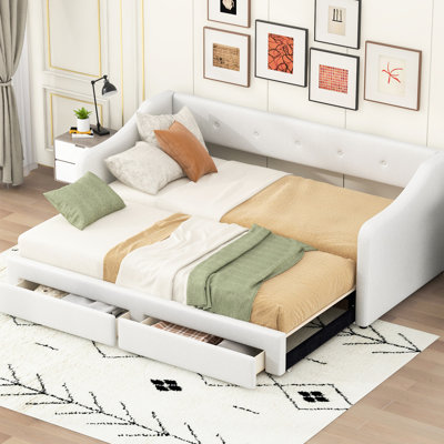 Lit de jour simple rembourré beige très grand avec deux tiroirs de rangement, support pour accoudoirs arrière extensible et support en lattes de bois