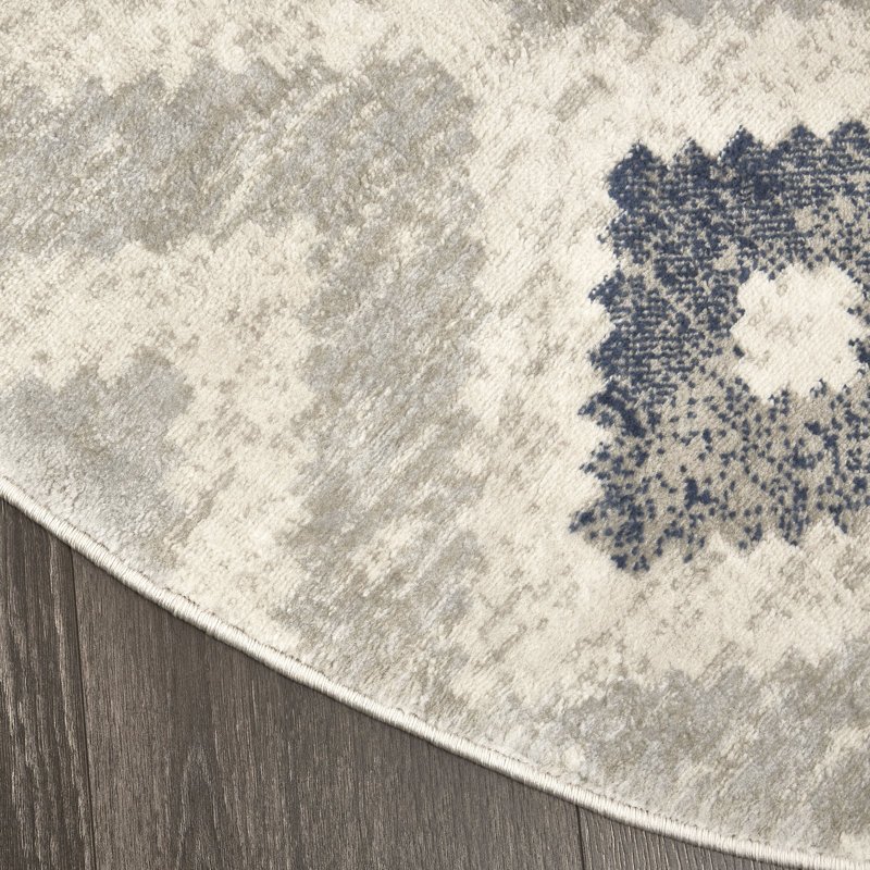 Tapis géométrique ivoire / bleu, Rond 5 pi 2 po