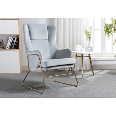 Chaise d'appoint rembourrée en velours avec pieds chromés dorés
