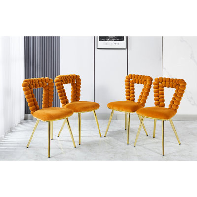 4 chaises orange: coussins moelleux, pieds en tube de fer, élégant pour la salle à manger, salon moderne 4: confortable, revêtement en tissu, différentes pièces pour les pieds