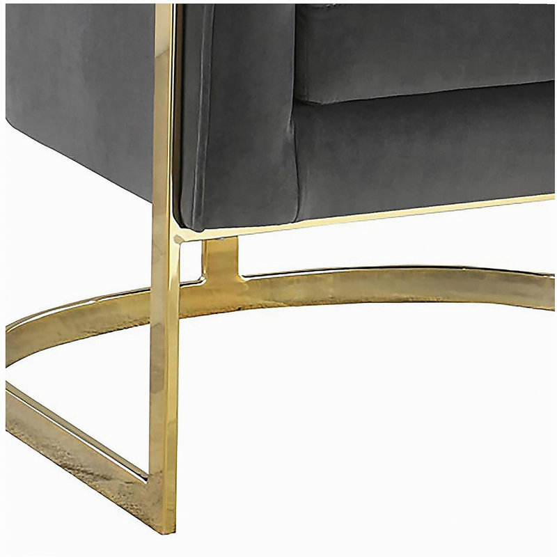 Fauteuil demi-tonneau capitonné gris foncé et doré