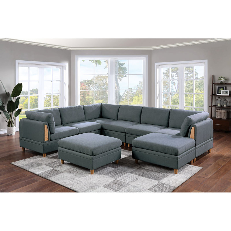 Salon moderne en tissu avec coin en coin et canapé contemporain en bois gris