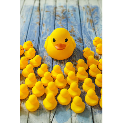 Rubber Ducks Gathering Around a Large Mother Duck. by Enviromantic