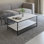 Opulent 43" Rectangular Coffee Table with Dual Marble Surfaces and Black Metal Frame