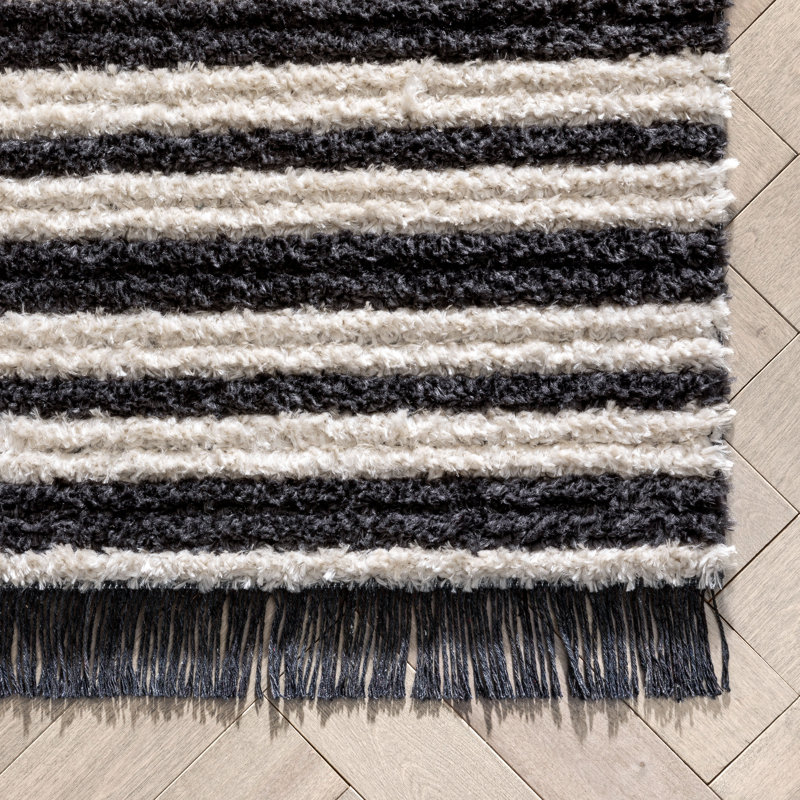 Ivory and Black Rectangular Synthetic Area Rug 5'3" x 7'3"