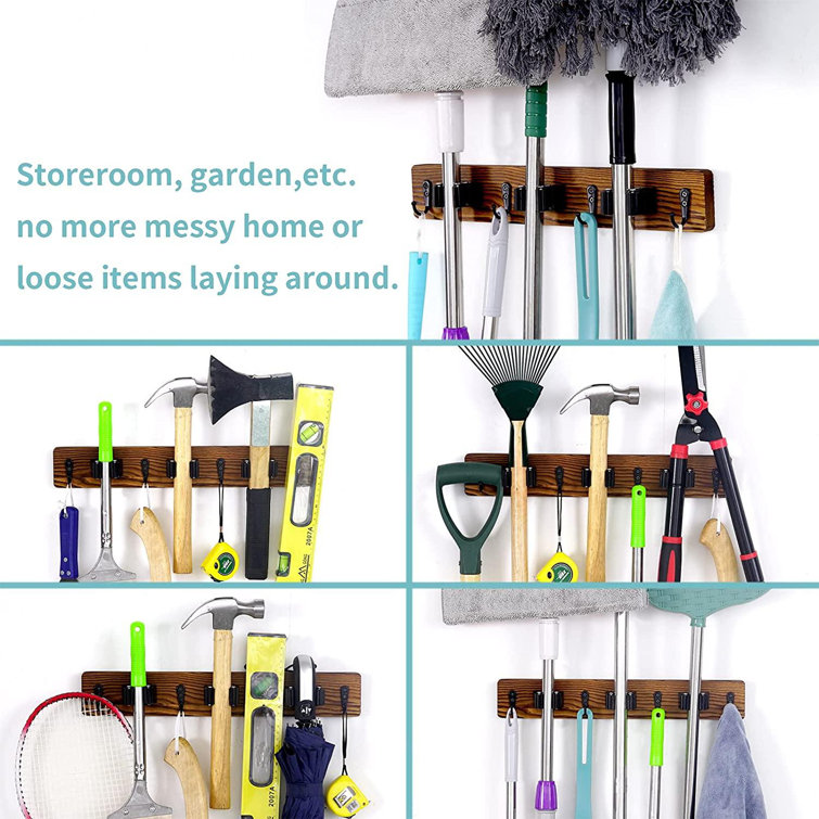https://assets.wfcdn.com/im/50781716/resize-h755-w755%5Ecompr-r85/2169/216911717/Mop+And+Broom+Holder+Wall+Mount%2C+Rustic+Solid+Wood+Holder+Garden+And+Kitchen+Garage+Tool+Organizer+Wall+Hanger+For+Home+Goods+%283+Positions+With+4+Hooks%29.jpg