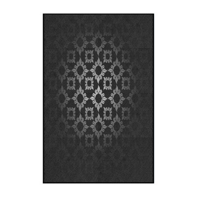 Tapis noir tissé à la machine
