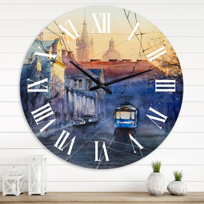 Horloge murale bleue et marine au coucher du soleil avec une église au coucher du soleil