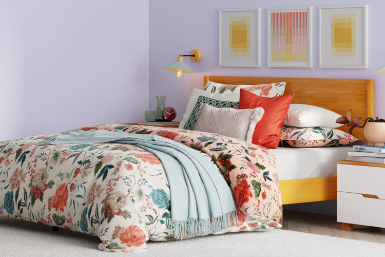 light purple bedroom with floral bedding