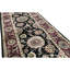 Manchuria Wool Oriental Area Rug in Black/Wine