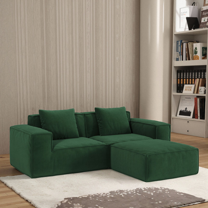 Canapé-lit modulaire avec configuration en velours côtelé souple et repose-pieds intégré pour une assise et un sommeil confortables