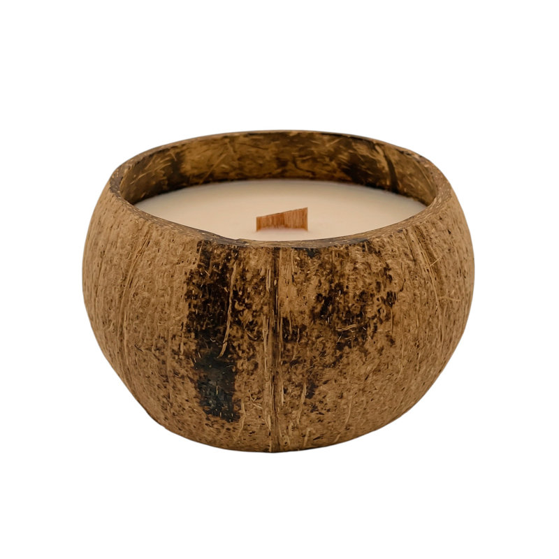 Bougie parfumée 4 "orchidée ivoire et sel de mer dans une coquille de noix de coco brune
