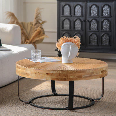 Table basse moderne et ronde à motif sculpté en bois avec pieds en métal