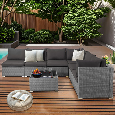 Ensemble de canapé modulaire d'extérieur en osier 7 pièces avec table basse et coussins épais 7 pièces