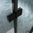 34 To 35-3/8 In. W X 72 In. H Bi-Fold Semi-Frameless Shower Doors In Matte Black With Clear Glass