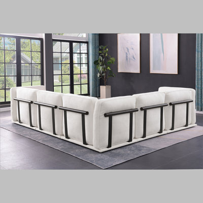 6-seater   modular fabric sofa, including a corner module and multiple independent seating areas, paired with square ottomans of the same material.