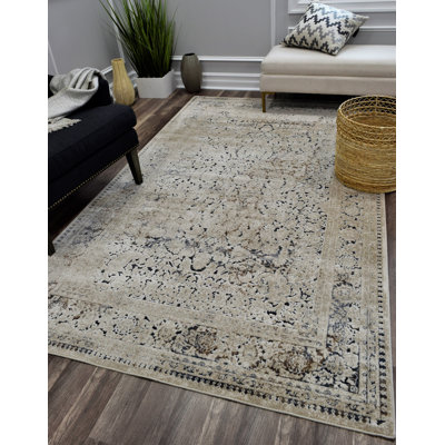 Tapis bleu marine à motif abstrait Danise