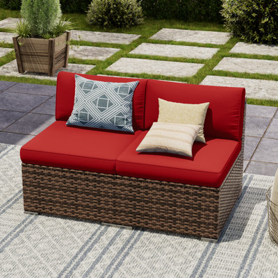 2 Piece Rattan Sectional Seating Group With Cushions