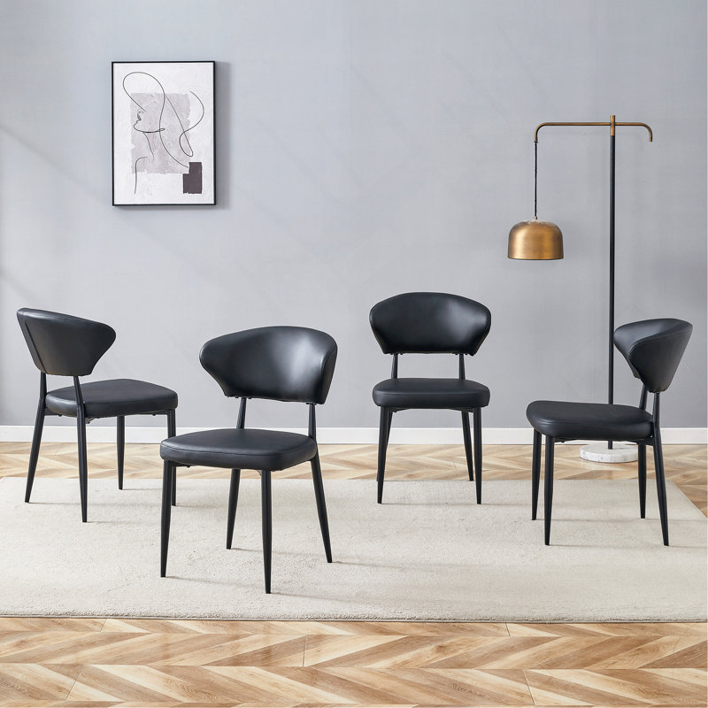 La chaise de salle à manger minimaliste et ergonomique, avec un dossier incurvé pour une conception confortable, libère une nouvelle position assise confortable et minimaliste. Un paquet de 4.