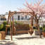 Banc de balancelle en bois 2 places avec support en A, roue de chariot et accoudoirs