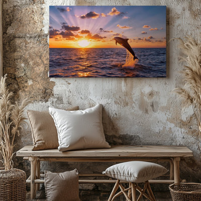 Canvas A Vibrant Sunset Scene Featuring A Dolphin Leaping Gracefully Above Wall Art The Shimmering Ocean Surface The Sun A Radiant Orb Canvas Wall Art