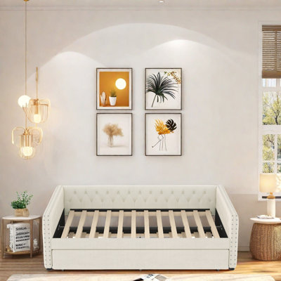 Élégant canapé-lit rembourré capitonné avec accoudoirs carrés à rivets, lit de jour double avec lit gigogne escamotable, structure en bois robuste, canapé-lit capitonné pour le salon et la chambre d'amis