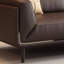 Causeuse coussin en similicuir noir