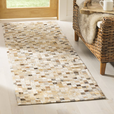 Tapis ivoire touffeté à la main Atchley