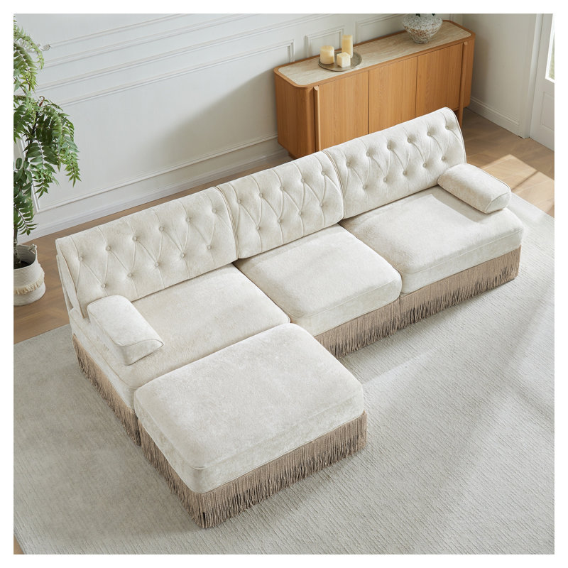 Canapé modulaire beige en velours 3 places avec dossier capitonné, jupe à pampille et repose-pieds, Velours beige
