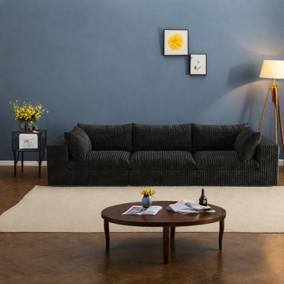 Canapé spacieux en nuage, tissu velours côtelé, style contemporain pour les espaces de vie