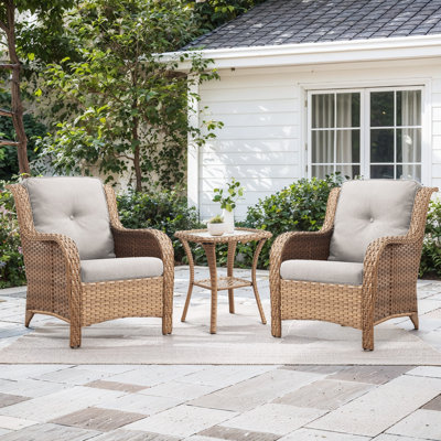 Fauteuil en osier avec coussins et table d'appoint Carolina