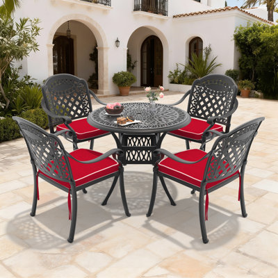 Ensemble de salle à manger de patio rond 4 personnes 35,43 po avec trou pour parasol, 4 chaises empilables avec coussins rouges