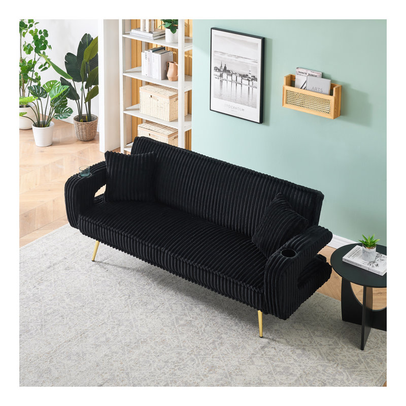 Le canapé droit en velours côtelé noir avec coussins décoratifs, de style minimaliste, convient au salon et au bureau