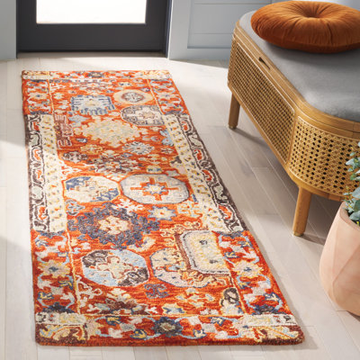 Shafiya Tufted Wool/Cotton Southwestern Rug in Rust/Ivory