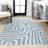 Jossa Abstract Two-Tone Low-Pile Machine-Washable Blue/Cream Rug-468594207